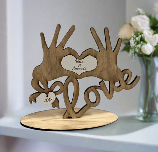 Oak veneer love hands with hanging heart - Laser LLama Designs Ltd